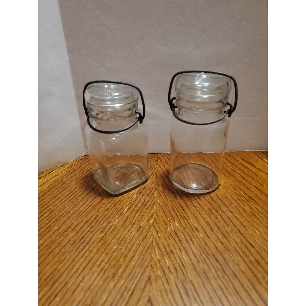 Two Vintage Anchor Hocking 1/2 Pint Latch Jars "17-k-643" & "K-1-444"